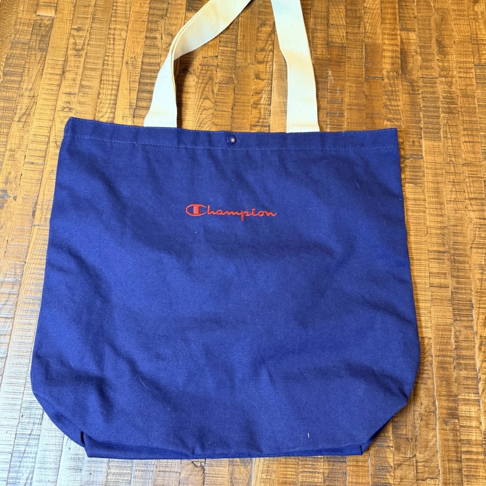 Champion Navy Tote Bag Embroidered Logo Snap Closure Interior Slip Pockets NWT